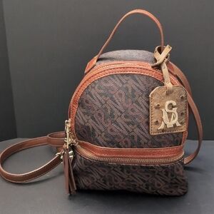 Steve Madden Mini Bjacki-L Brown/Black Monogrammed Backpack.